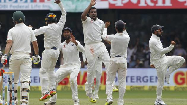 Ravichandran Ashwin and Indian cricket team members celebrate after the dismissal of an Australian batsman during the second Test. Get India vs Australia 2nd Test highlights here.(BCCI)