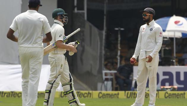 Virat Kohli chat with Steve Smith during day four of the second Test between India and Australia at the M Chinnaswamy Stadium in Bangalore on Tuesday.(BCCI)