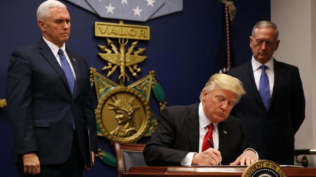 US President Donald Trump signed an executive order for a US travel ban, at the Pentagon in Washington on January 27, 2017.  Trump administration issued a new order on March 6 temporarily baring citizens of six Muslim-majority nations from entering the country. (REUTERS)