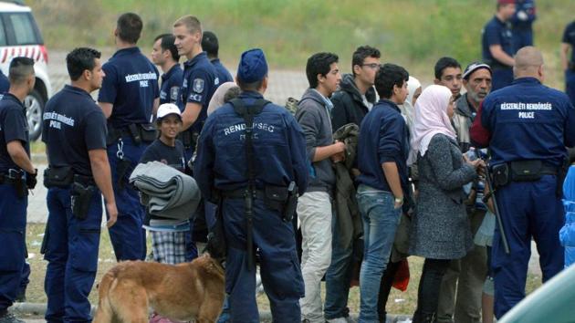 Asylum seekers at their temporary home of Roszke border village at the Hungarian-Serbian border in June, 2015. (AFP Photo) Asylum seekers at their temporary home of Roszke border village at the Hungarian-Serbian border in June, 2015. (AFP Photo)