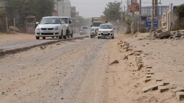 Residents said that the cemented approach road, built two years ago, was dug up without a concrete plan. The road leads CHD Avenue condominium to Sohna road. (Parveen Kumar/HT Photo) Residents said that the cemented approach road, built two years ago, was dug up without a concrete plan. The road leads CHD Avenue condominium to Sohna road. (Parveen Kumar/HT Photo)