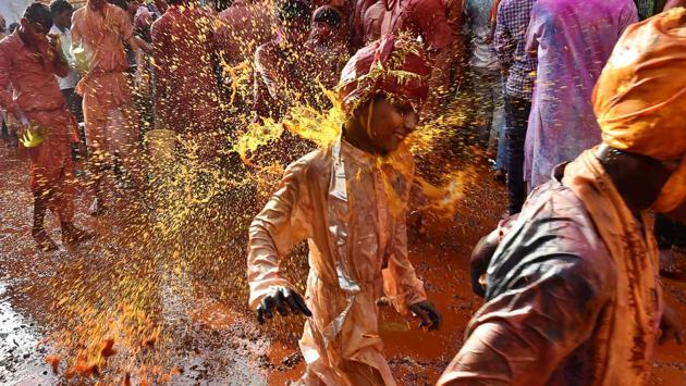 Men who are caught by the women of Barsana are made to wear female clothing and dance in public. (Ajay Aggarwal/HT PHOTO)