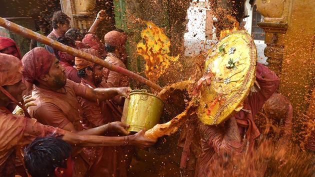 Lathmar Holi is celebrated days before the actual Holi. (Ajay Aggarwal/HT PHOTO)