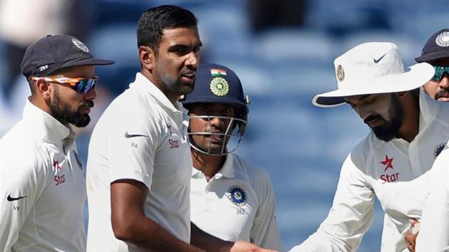Ravichandran Ashwin celebrates with teammates the wicket of Australian batsman Matt Renshaw. (PTI)