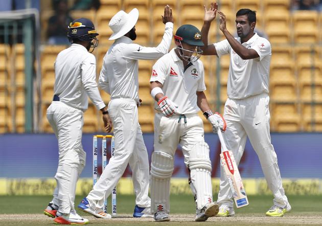 India cricket team’s Ravichandran Ashwin captured his 25th five-wicket innings haul, ending with 6-41 that included the dangerous David Warner (in pic), as he bowled the hosts to a thrilling win over Australia cricket team on Day 4 of the second Test at M Chinnaswamy Stadium on Tuesday. (AP) India cricket team’s Ravichandran Ashwin captured his 25th five-wicket innings haul, ending with 6-41 that included the dangerous David Warner (in pic), as he bowled the hosts to a thrilling win over Australia cricket team on Day 4 of the second Test at M Chinnaswamy Stadium on Tuesday. (AP)