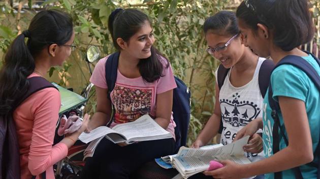 Light mood takes over the stress students feel just before the exam outside a centre at Goregaon in Mumbai. (Pratham Gokhale/HT Photo)