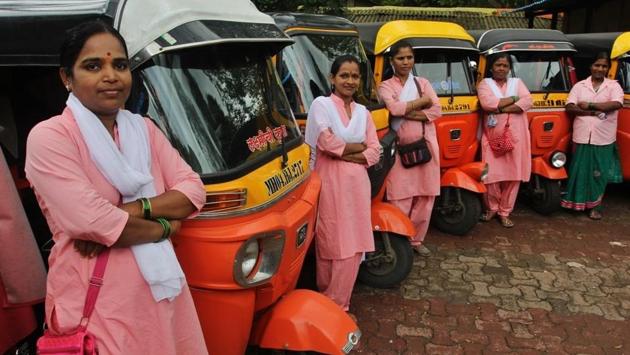 These pink/orange auto drivers have bravely fight all odds in Mumbai to work. (Praful Gangurde / HT Photo)