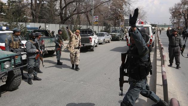 Security forces inspect the site of attack on a military hospital in Kabul, Afghanistan. Gunmen stormed the military hospital in a neighborhood in the Afghan capital that is also home to a number of embassies. (AP Photo) Security forces inspect the site of attack on a military hospital in Kabul, Afghanistan. Gunmen stormed the military hospital in a neighborhood in the Afghan capital that is also home to a number of embassies. (AP Photo)
