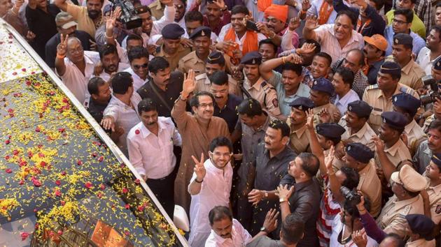 Shiv Sena president Uddhav Thackeray and son Aaditya join the celebrations after the party’s mayor candidate is elected. (Kunal Patil/HT Photo)