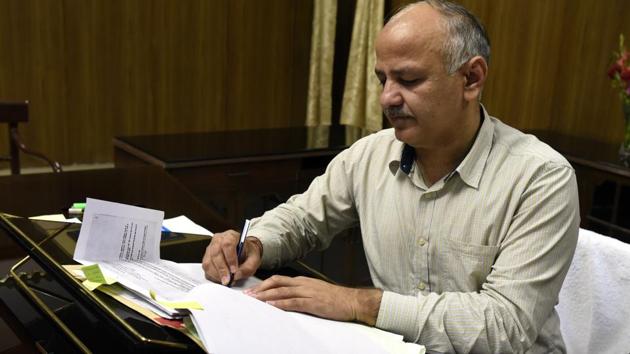 Deputy chief minister and finance minister of Delhi Manish Sisodia giving the final touches to 2017-18 Delhi budget at Assembly in New Delhi on Tuesday.(Sonu Mehta/HT PHOTO)