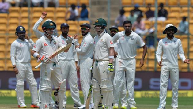 Steve Smith reportedly looked toward the players’ area in the stands when deciding whether to use the DRS in the Bangalore Test against India. (AFP) Steve Smith reportedly looked toward the players’ area in the stands when deciding whether to use the DRS in the Bangalore Test against India. (AFP)
