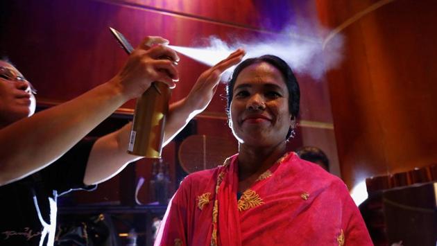 Survivors of acid attacks blazed through a unique fashion show in an effort to smash the conservative country's social prejudices about the victims. (Mohammad Ponir Hossain / REUTERS)