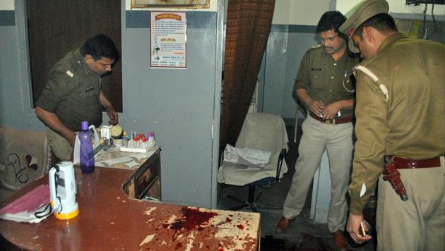 Police investigate the scene of the crime at the hospital. (HT) Police investigate the scene of the crime at the hospital. (HT)