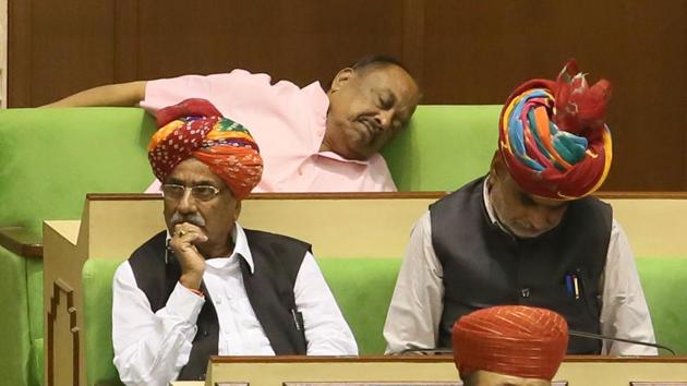 An MLA in the back row sleeps as budget details are read out in the assembly. Villages with population of more than 5,000 people will be developed as smart villages. (Himanshu Vyas/HT Photo) An MLA in the back row sleeps as budget details are read out in the assembly. Villages with population of more than 5,000 people will be developed as smart villages. (Himanshu Vyas/HT Photo)