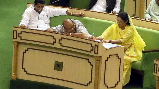 On state budget day, Recommendations of the seventh pay commission are to be implemented as an MLA rest with his head down on the table. (Himanshu Vyas/HT Photo) On state budget day, Recommendations of the seventh pay commission are to be implemented as an MLA rest with his head down on the table. (Himanshu Vyas/HT Photo)