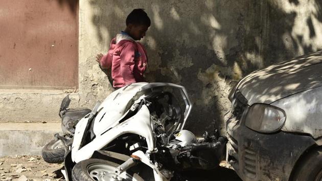 The damaged vehicle of the 17-year-old who was killed by a speeding Mercedes in Paschim Vihar area of Delhi on Sunday night.(Burhaan Kinu/HT Photo)