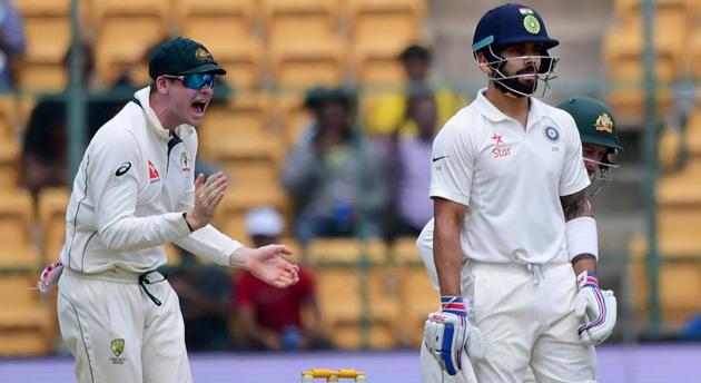 Virat Kohli (right) has been involved in aggressive talks with Steve Smith-led Australia in the ongoing Test series.(PTI)