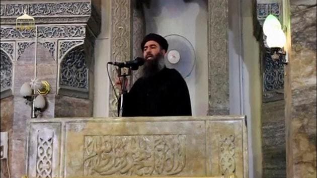 File photo of the reclusive Islamic State leader, Abu Bakr al-Baghdadi, making what would have been his first public appearance at a mosque in the centre of Iraq's second city, Mosul, on July 5, 2014.(Reuters)