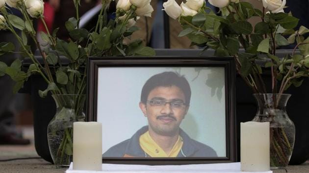 A picture of Srinivas Kuchibhotla, an immigrant from India who was recently shot and killed in Kansas, is surrounded by roses during a vigil in honor of him at Crossroads Park in Bellevue, Washington, U.S. March 5, 2017. (Reuters) A picture of Srinivas Kuchibhotla, an immigrant from India who was recently shot and killed in Kansas, is surrounded by roses during a vigil in honor of him at Crossroads Park in Bellevue, Washington, U.S. March 5, 2017. (Reuters)