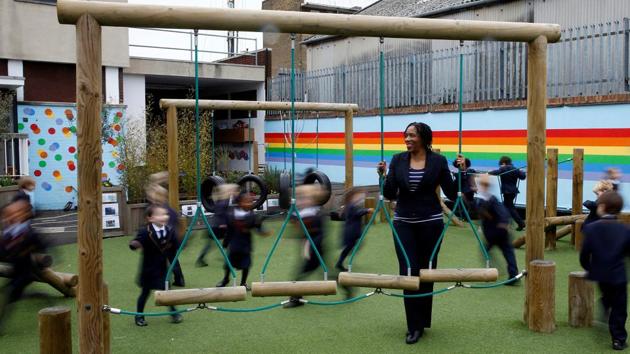 Maxine Mallett, 52, a headteacher at Rutherford House School, poses for a photograph at the school's playground in south London, Britain, February 22, 2017. "The most stressful time of my career was when I had children. Women who return to work after having a child are sometimes treated with suspicion, as if they now lack commitment to the school when it is quite the opposite," Mallett said. ‘We need to remove barriers and support all. Having a fulfilling career should not have to be a battle that you have to constantly fight.’ (Stefan Wermuth / REUTERS)