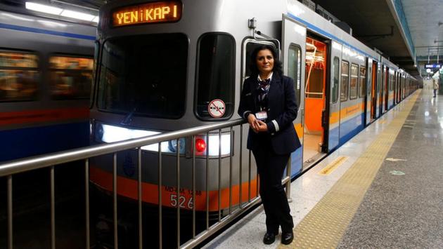 Serpil Cigdem, 44, an engine driver, poses for a photograph at Yenikapi station in Istanbul, Turkey. (Osman Orsal / REUTERS)