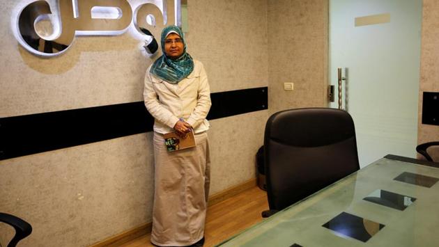 Samah Abdelaty, 38, a writer and chief of the investigations department at Al Watan Newspaper, poses for a photograph at the headquarters of the newspaper in Cairo, Egypt, February 26, 2017. (Amr Abdallah Dalsh / REUTERS)