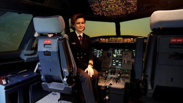Pilot Maria Uvarovskaya poses for a photograph in the A320 flight simulator at the Aeroflot training centre at Sheremetyevo airport outside Moscow, Russia, February 20, 2017. ‘Much more can be done by the women themselves to solve such problems (gender inequality),’said Uvarovskaya. (Grigory Dukor / REUTERS)