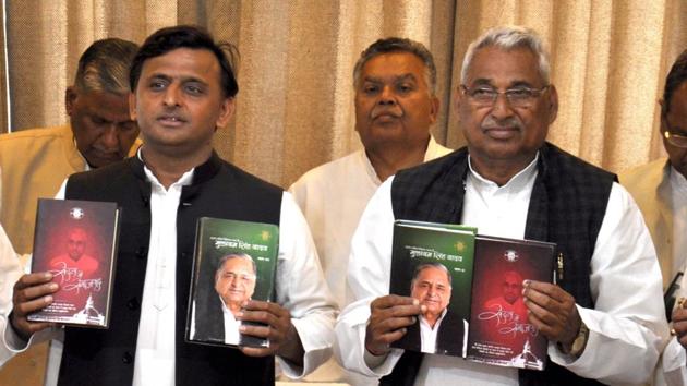 CM Akhilesh Yadav and Vidhan Sabha speaker Mata Prasad Pandey releasing collection of Mulayam Singh Yadav’s speeches at Vidhan Bhawan, in Lucknow on Wednesday.(Ashok Dutta/ HT Photo)