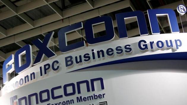 Logos of Foxconn and Ennoconn are seen during the annual Computex computer exhibition in Taipei, Taiwan (Reuters photo) Logos of Foxconn and Ennoconn are seen during the annual Computex computer exhibition in Taipei, Taiwan (Reuters photo)