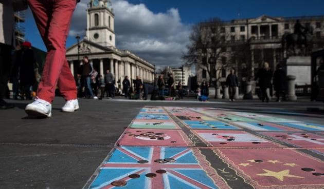 Pound sterling coins are pictured on a chalk drawing of a Union flag on the pavement in Trafalgar Square in central in London. Britain's Finance minister Philip Hammond earlier this week said he would keep chopping away at the deficit to get Britain fit to face Brexit. (AFP) Pound sterling coins are pictured on a chalk drawing of a Union flag on the pavement in Trafalgar Square in central in London. Britain's Finance minister Philip Hammond earlier this week said he would keep chopping away at the deficit to get Britain fit to face Brexit. (AFP)