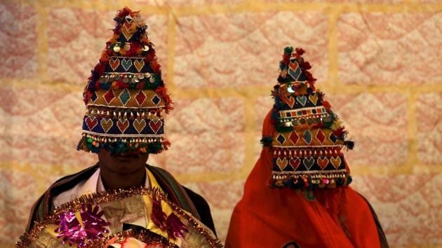 A bride and groom in traditional garb during their wedding ceremony in Karachi, Pakistan, in 2016. (Reuter File Photo) A bride and groom in traditional garb during their wedding ceremony in Karachi, Pakistan, in 2016. (Reuter File Photo)