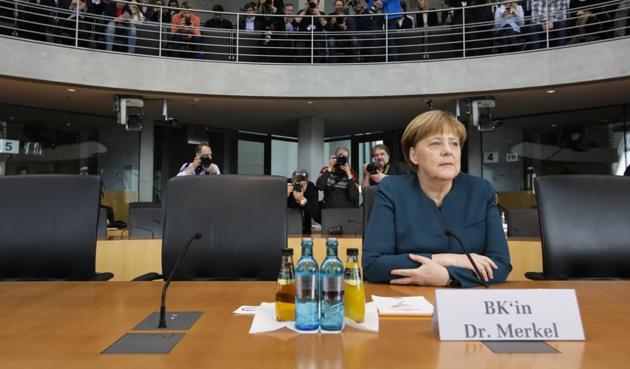 German Chancellor Angela Merkel takes place for a questioning at a German parliamentary investigation committee about the Volkswagen emissions cheating software in Berlin on Wednesday.(AP)