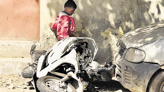 The mangled scooty of 17-year-old Atul Arora who died on the spot after being knocked down by a speeding Mercedes in the Paschim Vihar on Monday.(Burhaan Kinu/HT PHOTO)