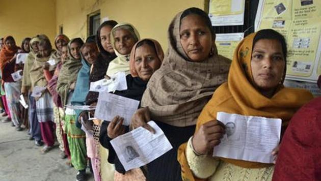 Women queue up with their election identity cards as they wait to cast their votes in Amritsar for the Punjab assembly election on February 4, 2017.(AP File Photo)