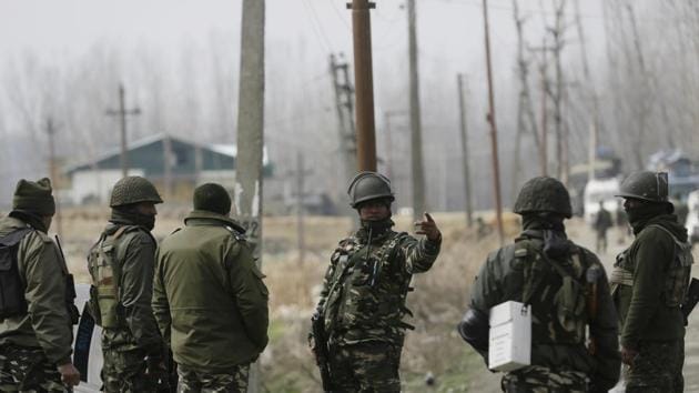 Security forces near the site of gun battle at Padgampora, 43 Kilometers , south of in Srinagar, Jammu and Kashmir on Thursday, March. 9, 2017.(AP)