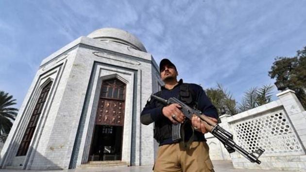 A Pakistani policeman stands guard at the shrine of Rehman Baba in Peshawar on February 17 following bomb attack on a shrine of 13th century Muslim Sufi saint Lal Shahbaz Qalandar in the town of Sehwan in Sindh province.(AFP File)