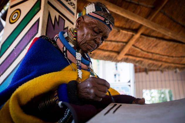 Born on 11 November 1935, Esther lives in the Mabokho village of Weltevrede (Afrikaans for “well satisfied”) in the KwaMahlanga district in Mpumalanga Province. Esther’s contribution to South African contemporary art and the impression that she has left on so many people globally makes her a national treasure. (GULSHAN KHAN / AFP) 