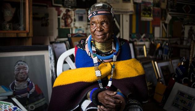 South African artist Esther Mahlangu, 81, poses at her home in Mabhoko Village.  (AFP) 