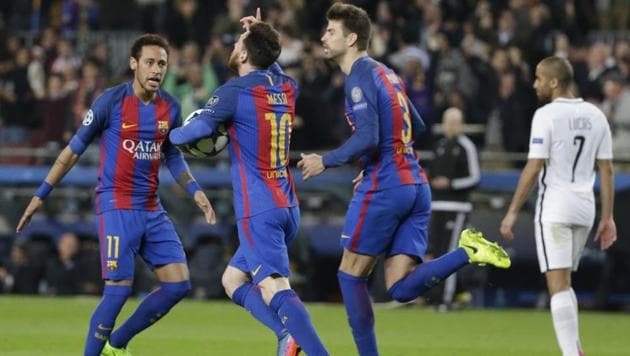 Barcelona's Gerard Pique (right) celebrates with Lionel Messi (centre) and Neymar after FC Barcelona’s goal against Paris-Saint Germain in UEFA Champions League. (AP) Barcelona's Gerard Pique (right) celebrates with Lionel Messi (centre) and Neymar after FC Barcelona’s goal against Paris-Saint Germain in UEFA Champions League. (AP)