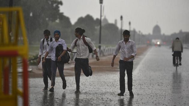 Students enjoy the sudden rain in New Delhi on Thursday.(Raj K Raj/ HT Photo) Students enjoy the sudden rain in New Delhi on Thursday.(Raj K Raj/ HT Photo)