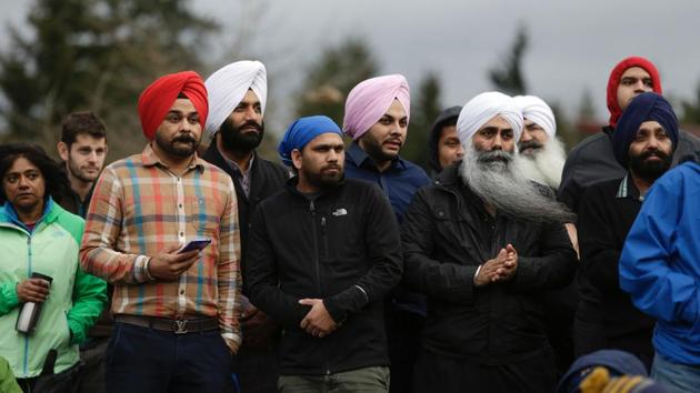 Members of the South Asian community and others attend a peace vigil for Srinivas Kuchibhotla, the 32-year-old Indian engineer killed at a bar Olathe, Kansas, in Bellevue, Washington on March 5, 2017 (AFP) Members of the South Asian community and others attend a peace vigil for Srinivas Kuchibhotla, the 32-year-old Indian engineer killed at a bar Olathe, Kansas, in Bellevue, Washington on March 5, 2017 (AFP)