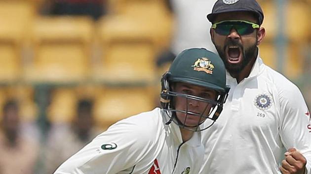Virat Kohli has been accused by an Australian paper of hurling a bottle at an Australian official during the Bangalore Test.(AP)
