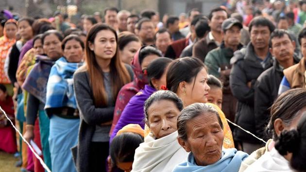 People stand in a queue to cast their votes in the last phase of Manipur election. Polling in five states ended on Wednesday.(PTI File Photo)