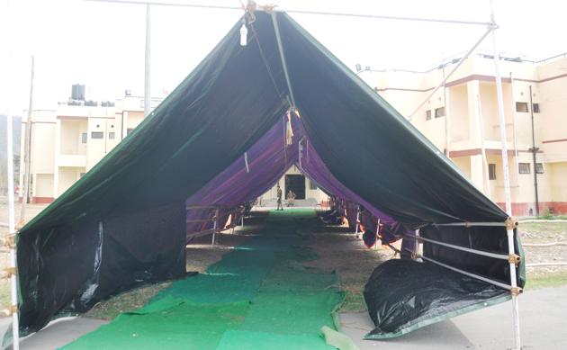 The route to counting centre is covered with waterproof tent at Maharana Pratap Sports College in Dehradun (Vinay Santosh Kuma/HT Photo) The route to counting centre is covered with waterproof tent at Maharana Pratap Sports College in Dehradun (Vinay Santosh Kuma/HT Photo)