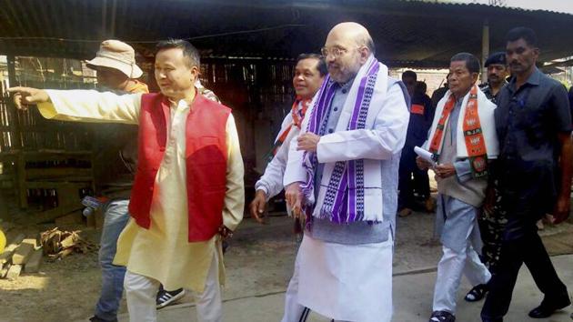 BJP President Amit Shah during a door to door election campaign in Wangkhei constituency of Imphal East district in Manipur on March 1 as BJP looks to make inroads in the north-eastern state. (PTI)