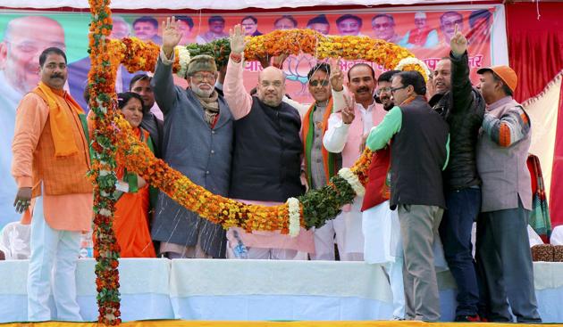 BJP's national president Amit Shah being garlanded at an election meeting at New Tehri in Uttarakhand. (PTI File Photo) BJP's national president Amit Shah being garlanded at an election meeting at New Tehri in Uttarakhand. (PTI File Photo)