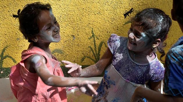 At their Agripada school, the students enjoyed an eco-friendly Holi. (Anshuman Poyrekar/HT Photo)