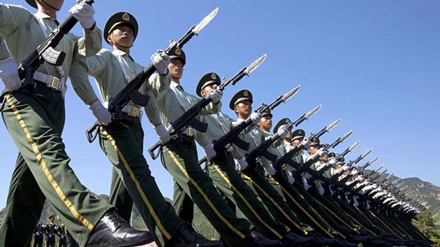 While the army reserve will be reduced, the reserves of other military services including the navy, air force and the rocket force, (missile force) will be increased in a bid to keep up with China’s military modernisation. (AP File Photo) While the army reserve will be reduced, the reserves of other military services including the navy, air force and the rocket force, (missile force) will be increased in a bid to keep up with China’s military modernisation. (AP File Photo)