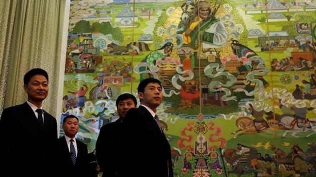 People stand ahead of a Tibet Autonomous Region group discussion session during China's National People's Congress (NPC) in Beijing, China. (Reuters Photo) People stand ahead of a Tibet Autonomous Region group discussion session during China's National People's Congress (NPC) in Beijing, China. (Reuters Photo)