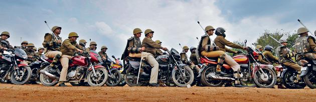 A large posse of police personnel rushed to Sikandrarao area to maintain law and order soon after getting the report of graves desecration on Friday. (HT File Photo for representational purpose only) A large posse of police personnel rushed to Sikandrarao area to maintain law and order soon after getting the report of graves desecration on Friday. (HT File Photo for representational purpose only)